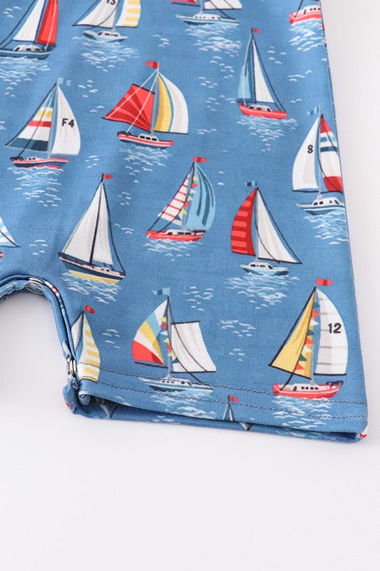 Navy sailboat print pocket boy romper